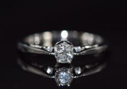 An 18ct white gold ring set with a diamond of approximately 0.22ct, 3.0g, size M/N