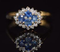 A 9ct gold ring set with sapphires and diamonds, 2.7g, size L