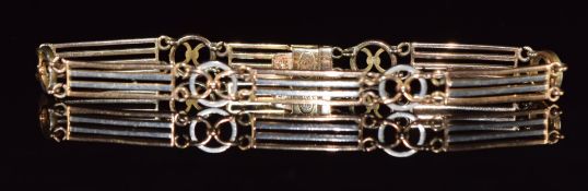 A c1915 15ct gold and platinum bi-coloured bracelet, length 18.5cm, 11.1g