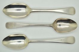 Three various Georgian hallmarked silver Old English pattern dessert spoons, various dates and