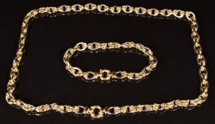 A 14k gold bi-coloured necklace made up of oval knotted links, length 33cm, 26.8g
