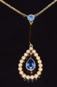 Edwardian 18ct gold pendant set with a round cut sapphire of approximately 0.2ct and a drop pear cut