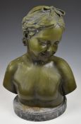 Bronze bust of a child with a bow in their hair, height 44cm