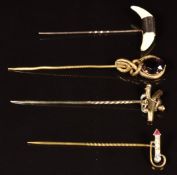 Victorian 9ct gold stick pin set with two teeth, a yellow metal stick pin and two further