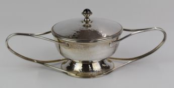Derek Elliott Guild of Handicrafts hallmarked silver twin handled covered bowl, with hammered