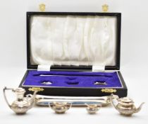 Cased Elizabeth II hallmarked silver novelty miniature tea set, Birmingham 1978, maker Peter John