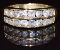 A 9ct gold ring set with two rows of tanzanites, 2.1g, size L