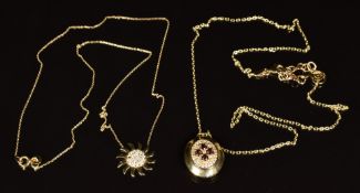 Two 14k gold pendants set with cubic zirconia, both on 14k gold chains, 7.7g