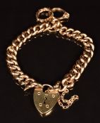 A 9ct rose gold bracelet, with 9ct gold charm in the form of three rings, length 18cm, 13.8g