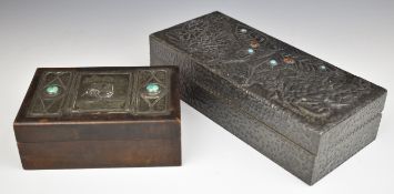 Two Arts & Crafts style pewter and cabochon decorated trinket boxes, length of longest 27cm