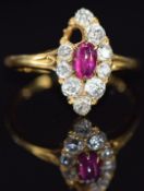Victorian 18ct gold ring set with a pink sapphire cabochon and old cut diamonds (one diamond