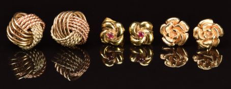 Three pairs of 9ct gold earrings, comprising ruby set, knots and flowers, 6.2g