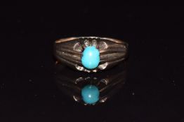 A 9ct rose gold ring set with a turquoise cabochon, 3g, size M