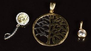 Three 14k gold pendants, two set with cubic zirconia, 4g