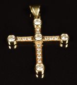 A 14k gold cross pendant set with diamonds, the largest approximately 0.18ct, 4.9g