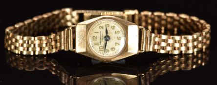 Winegartens 9ct gold ladies wristwatch with blued hands, Arabic numerals, silver dial and 17 jewel