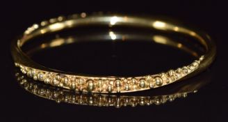 Bespoke 18ct gold bangle with beadwork decoration, maker PD, 33.3g