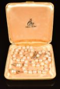 A single strand of cultured pearls with 9ct gold clasp and Ciro 9ct gold earrings set with a faux