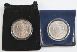 Two 1921 Morgan dollars, one with 'D' mint mark