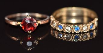 Two 9ct gold rings, one set with a round cut garnet and the other with synthetic spinel, 3.4g,