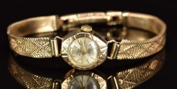 Swiss Empress 9ct gold ladies wristwatch with gold hands and hour markers, silver dial, engraved