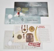 Two PNC stamp and coin covers comprising Abolition of Slave Trade £2 and Trinity Lighthouse £2