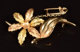 An 18ct gold brooch in the form of a flower, 5.7g