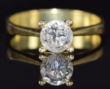 An 18k gold ring set with a round cut diamond of approximately 0.95ct, 4.3g, size P