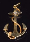 Edwardian 18ct gold pendant in the form of an anchor and rope, set with an old cut diamond measuring