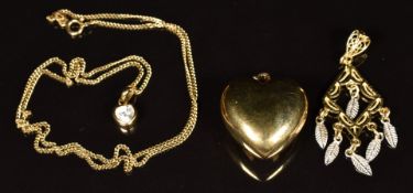 Two 14k gold pendants, 14k gold chain (5.3g) and a 9ct gold heart pendant (2.7g)