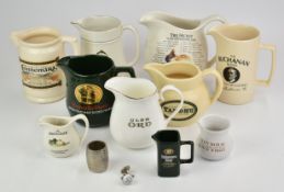 Whisky advertising jugs including two early Macallan, Glen Ord and Tamdhu, Laphroaig 'Love it,