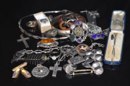 A collection of silver jewellery including bracelet, rings, two pairs of earrings, brooch in the