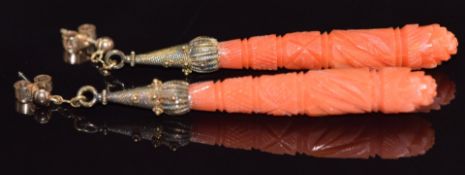 A pair of 19thC carved coral earrings with filigree mounts