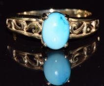 A 9ct gold ring set with a turquoise cabochon, 2.9g, size M/N