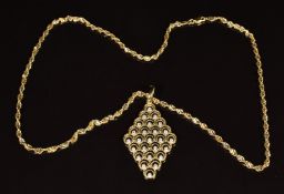 A 14k gold pendant set with cubic zirconia on 14k gold chain made up of twisted links, 7.9
