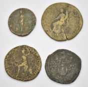 Four Roman copper / bronze coins including Hadrian, smallest 24mm diameter, largest 34mm