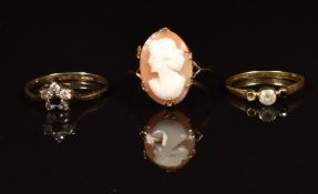 A 14k gold ring (0.9g) and two 9ct gold rings (3.5g), sizes O, M & J