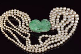 Art Deco Chinese white gold clasp set with jadeite in the form of fruit, on a triple strand of pearl