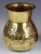 Arts & Crafts brass vase in the manner of Liberty, with embossed decoration of flowers and leaves,