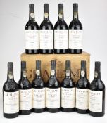 Eleven bottles of Graham's 1977 vintage port ,75cl, with wooden case