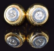 A pair of 18k gold earrings each set with a diamond of approximately 0.08ct, 5g