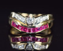 An 18ct gold ring set with calibre cut rubies and diamonds, 4.7g, size K