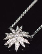 Tiffany & Co platinum necklace set with diamonds in a starburst design, on platinum Tiffany & Co