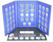 Windsor Mint two plated coin collections, one silver plated with gold overlay, the other gold plated