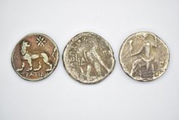 Three Ancient Greek silver coins to include a Ptolomy of the King of Cyprus, each around 24mm