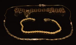 A 9ct gold tri-coloured necklace, 9ct gold gate bracelet and a 9ct gold rope twist section of