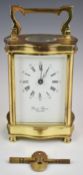 Gilt cased carriage clock by David Peterson with French movement, height including handle 15.5cm