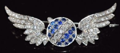 Art Deco 18ct white gold brooch in the form of a circle and wings set with sapphires and diamonds,