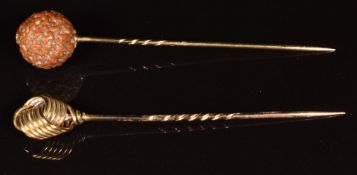 Victorian stick pin set with a Rudraksha nut and a yellow metal stick pin