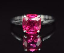 A platinum / 18ct white gold ring set with a synthetic ruby, 2.2g, size L